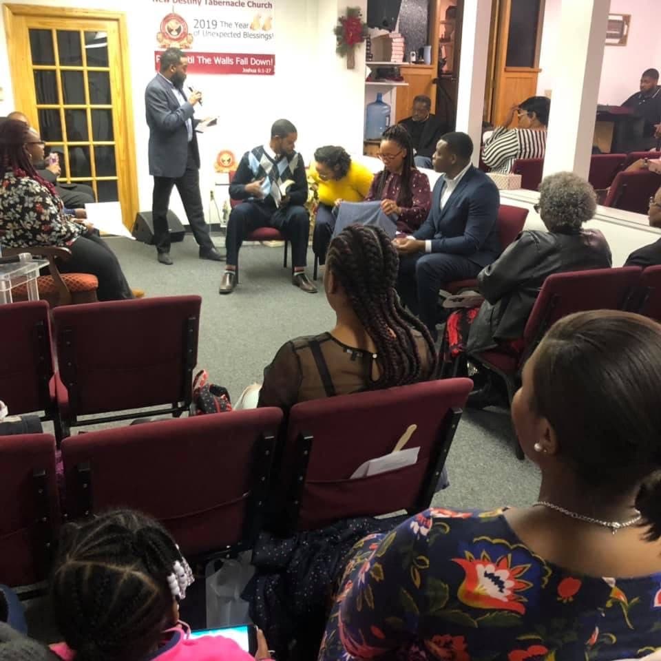 Church members gathered for a Bible study discussion